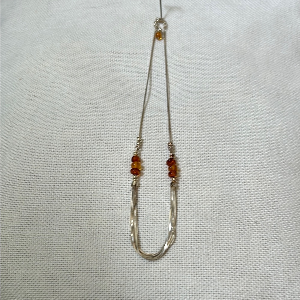 Elegant Silver and Amber Beaded Necklace